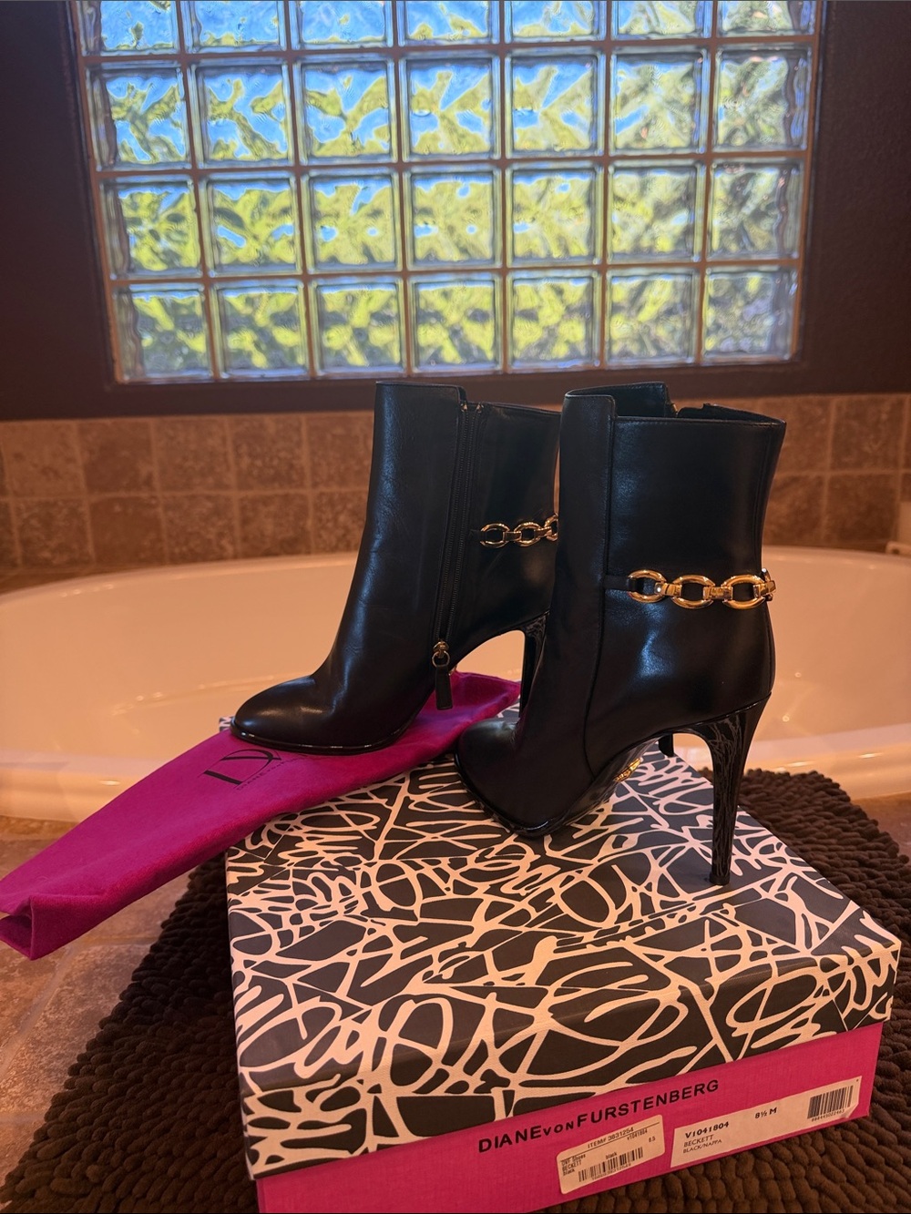 Diane Von Furstenberg Black Leather Ankle Boots with Gold Chain Accent